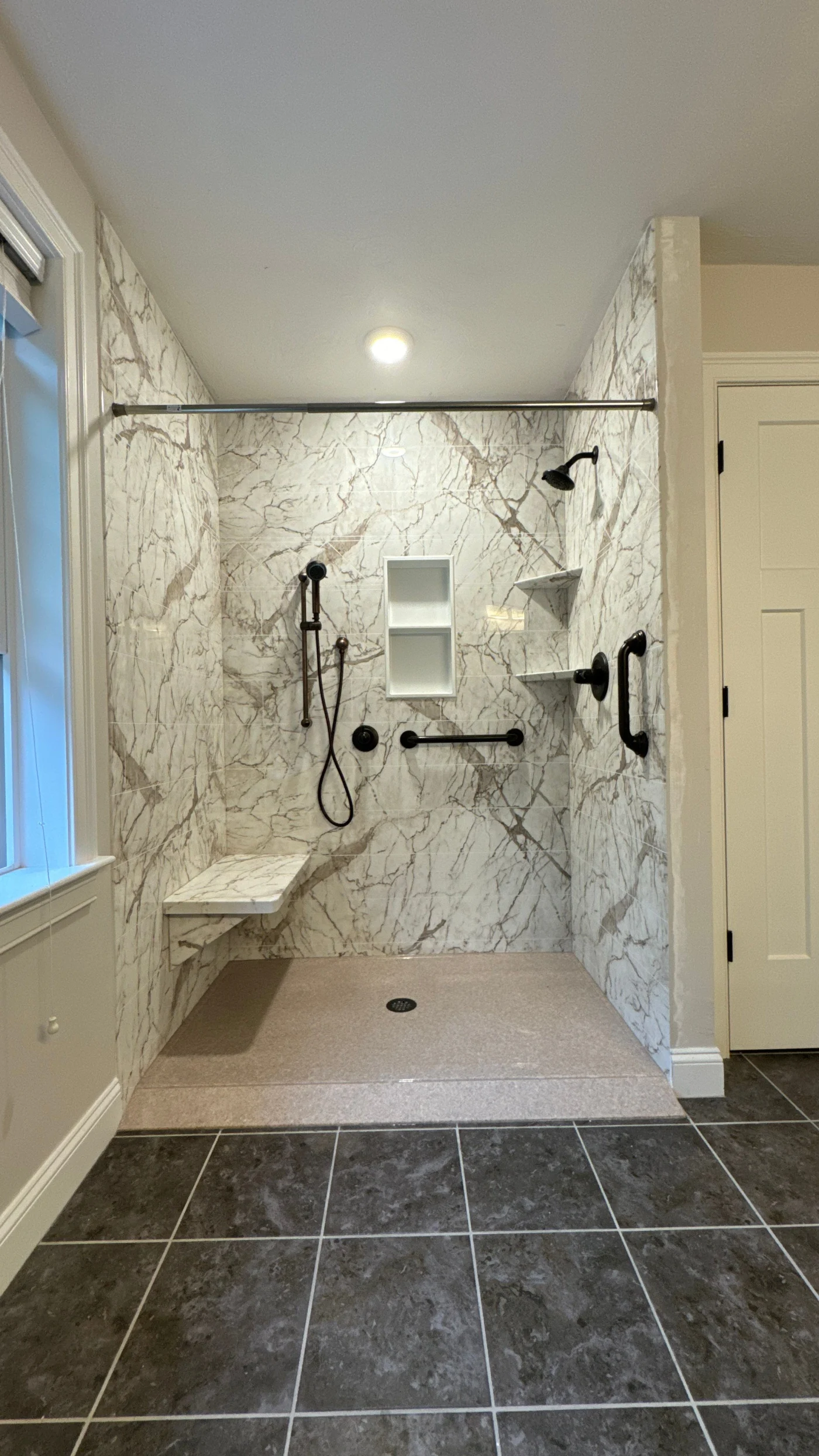 Roll-in Shower vs. Walk-in Tub: NJ & DE Cost & Safety Guide (2026)